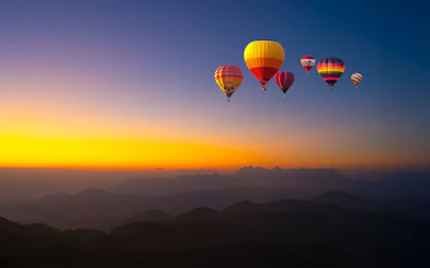 Hot-air balloons over Doi Luang Chiang Dao at sunrise, Chiang Mai.