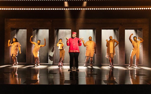 Performers on stage during "A Strange Loop" musical.