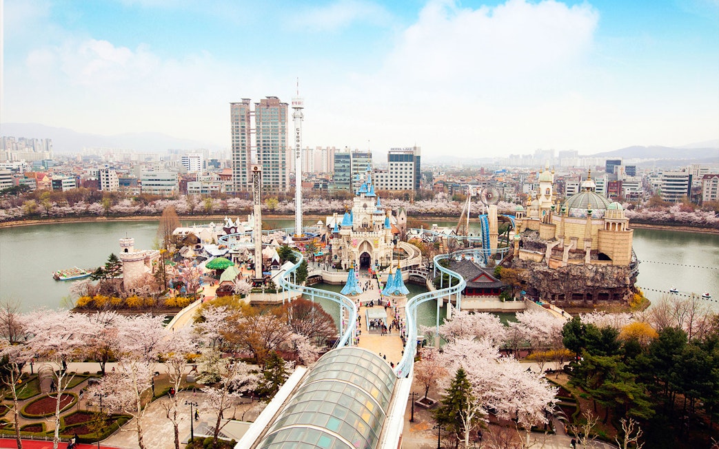 Lotte World amusement park and Seoul cityscape view from Seoul Sky Observatory.