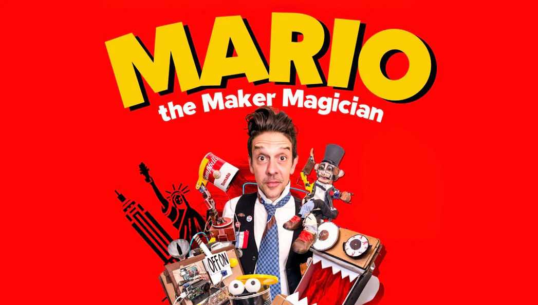 Mario The Maker Magician surrounded by whimsical props and gadgets.