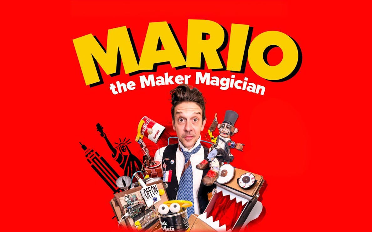 Mario The Maker Magician surrounded by whimsical props and gadgets.
