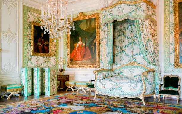 Madame Victoires Room at the Palace of Versailles with ornate decor and paintings.