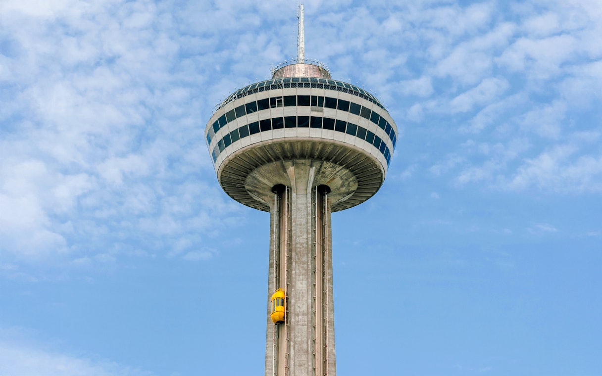 Skylon Tower with observation deck and yellow elevator in Niagara Falls, Ontario.