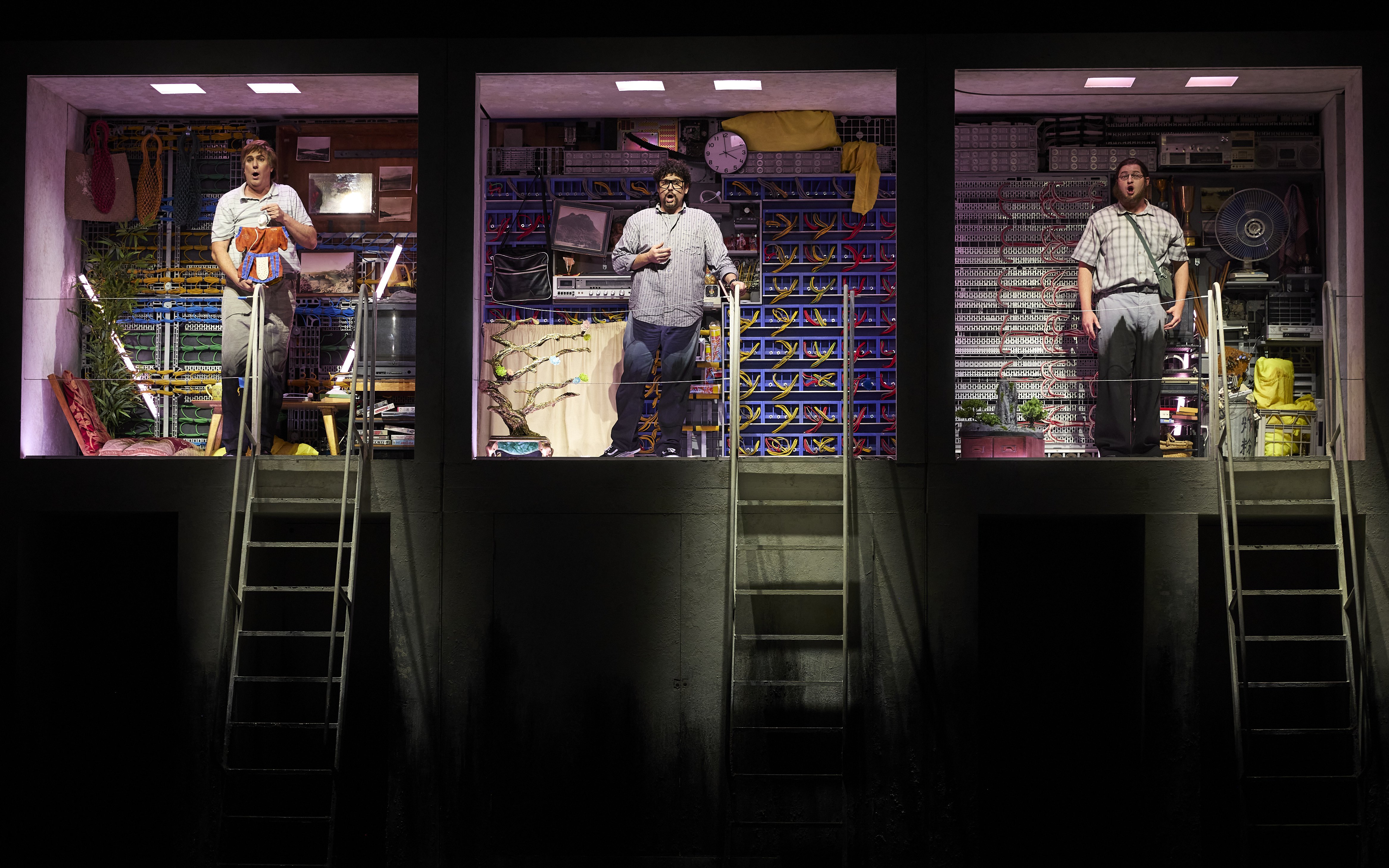 Stage performance of Turandot in Sydney with three performers in colorful set.