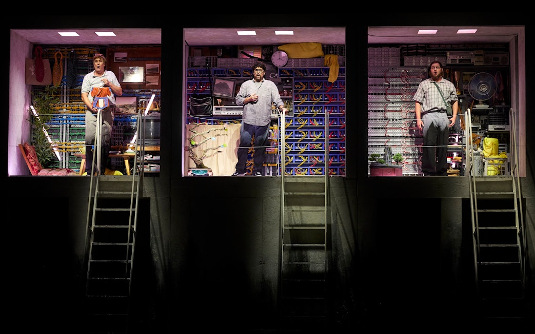 Stage performance of Turandot in Sydney with three performers in colorful set.