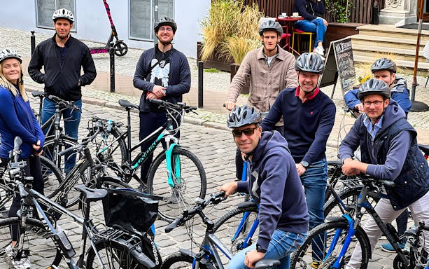 Group of cyclists on a private bike tour on Chlebnicka Street, Gdańsk.