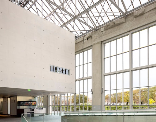 Orangerie Museum interior with large windows and modern architecture.