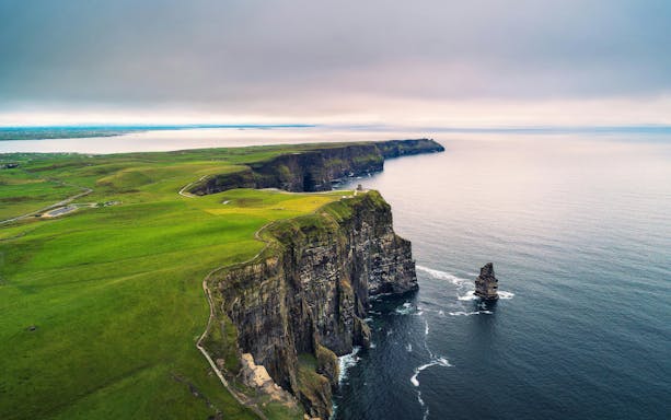 Cliffs of Moher, Ireland, with rugged cliffs and Atlantic Ocean view.