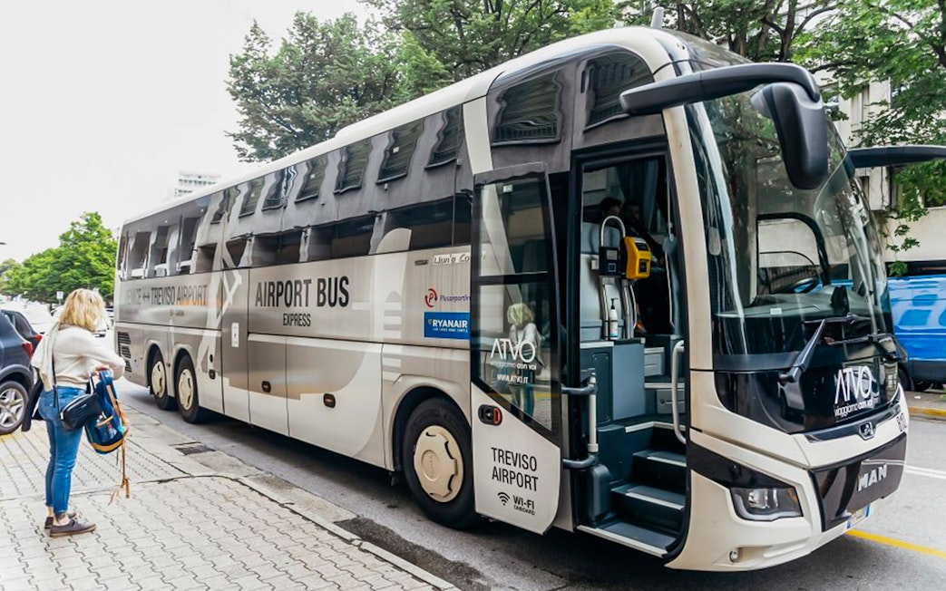 ATVO bus at pickup stop for airport transfer, Venice.