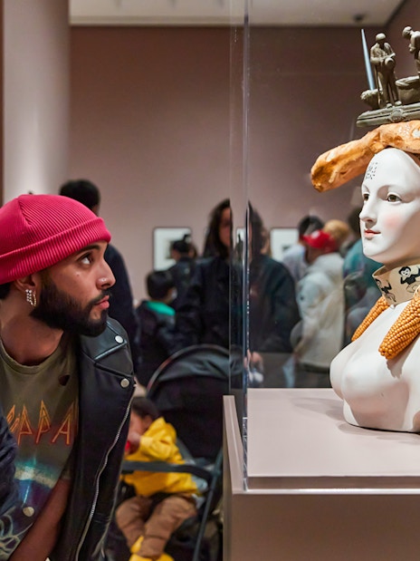 Guest viewing a unique sculpture at The Museum of Modern Art.