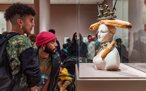 Guest viewing a unique sculpture at The Museum of Modern Art.