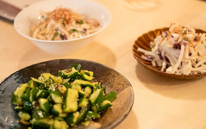 Cucumber salad and root vegetable dishes prepared in a Tokyo izakaya-style cooking class.