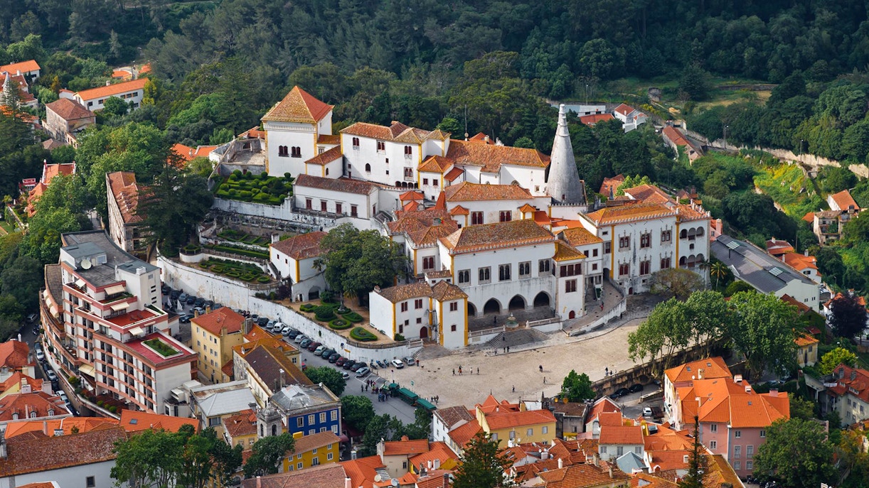 National Sintra Palace aerial view with surrounding gardens and town, Sintra, Portugal.