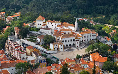National Sintra Palace aerial view with surrounding gardens and town, Sintra, Portugal.