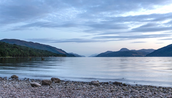 Loch Ness with Highlands backdrop on tour from Inverness.