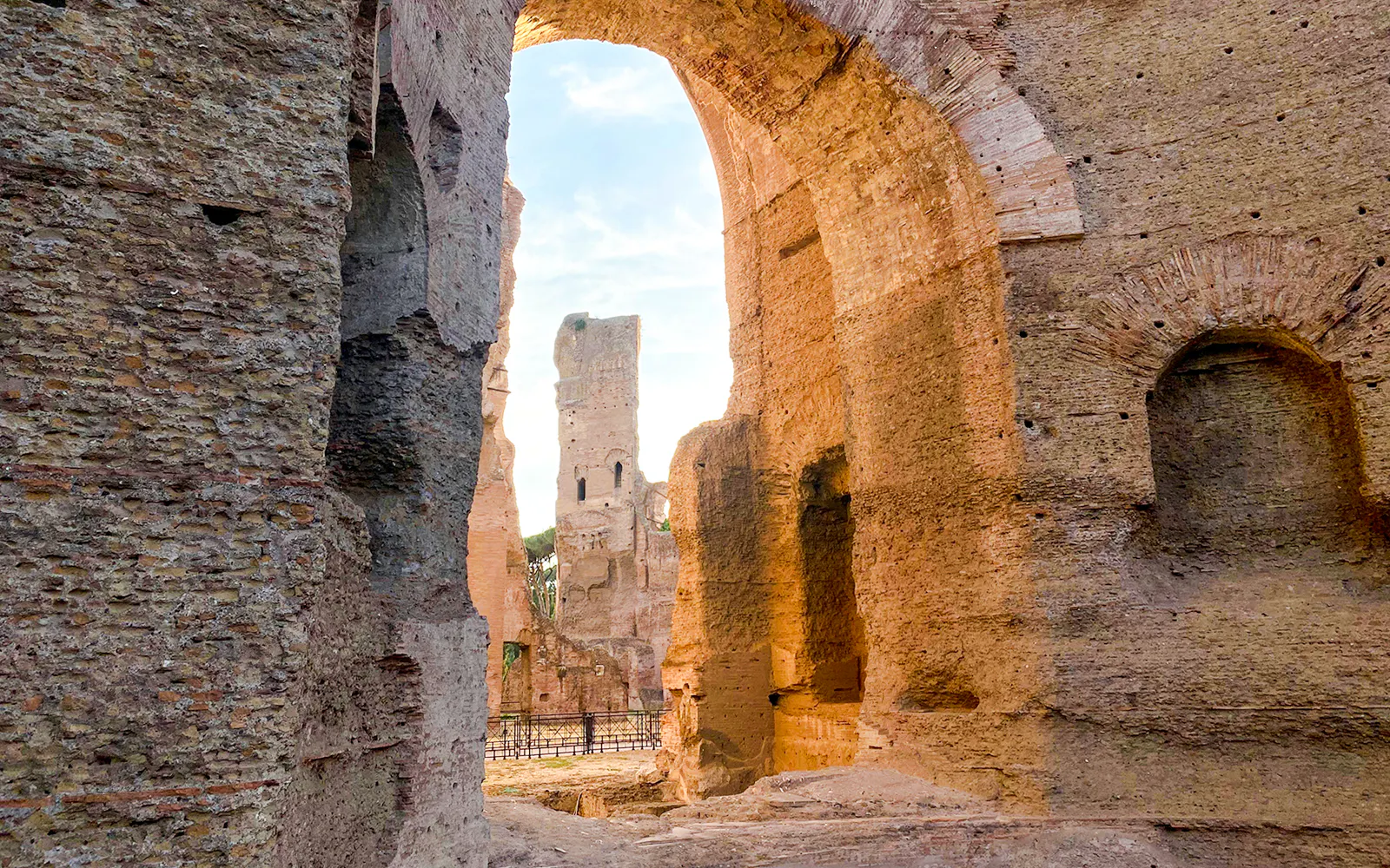 Ancient stone arches and walls of the Baths of Caracalla in Rome.