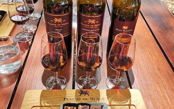 Plaisir de Merle wine tasting setup on Franschhoek Wine Tram Xplorer Tour, Cape Town.