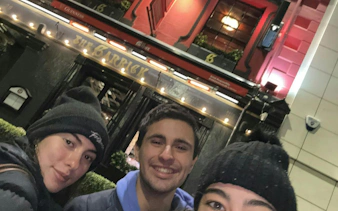 Visitors outside The Garrick Bar during Belfast Secret Society Detective Mystery game.