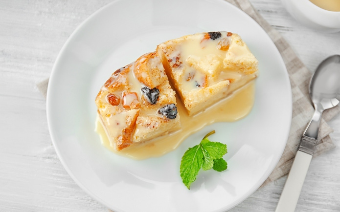 New Orleans Bread Pudding with sauce on Steamboat Natchez Dinner Cruise.