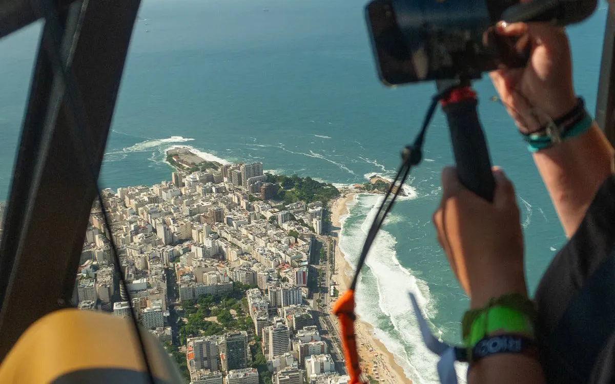 Aerial view of Rio de Janeiro coastline during helicopter tour.