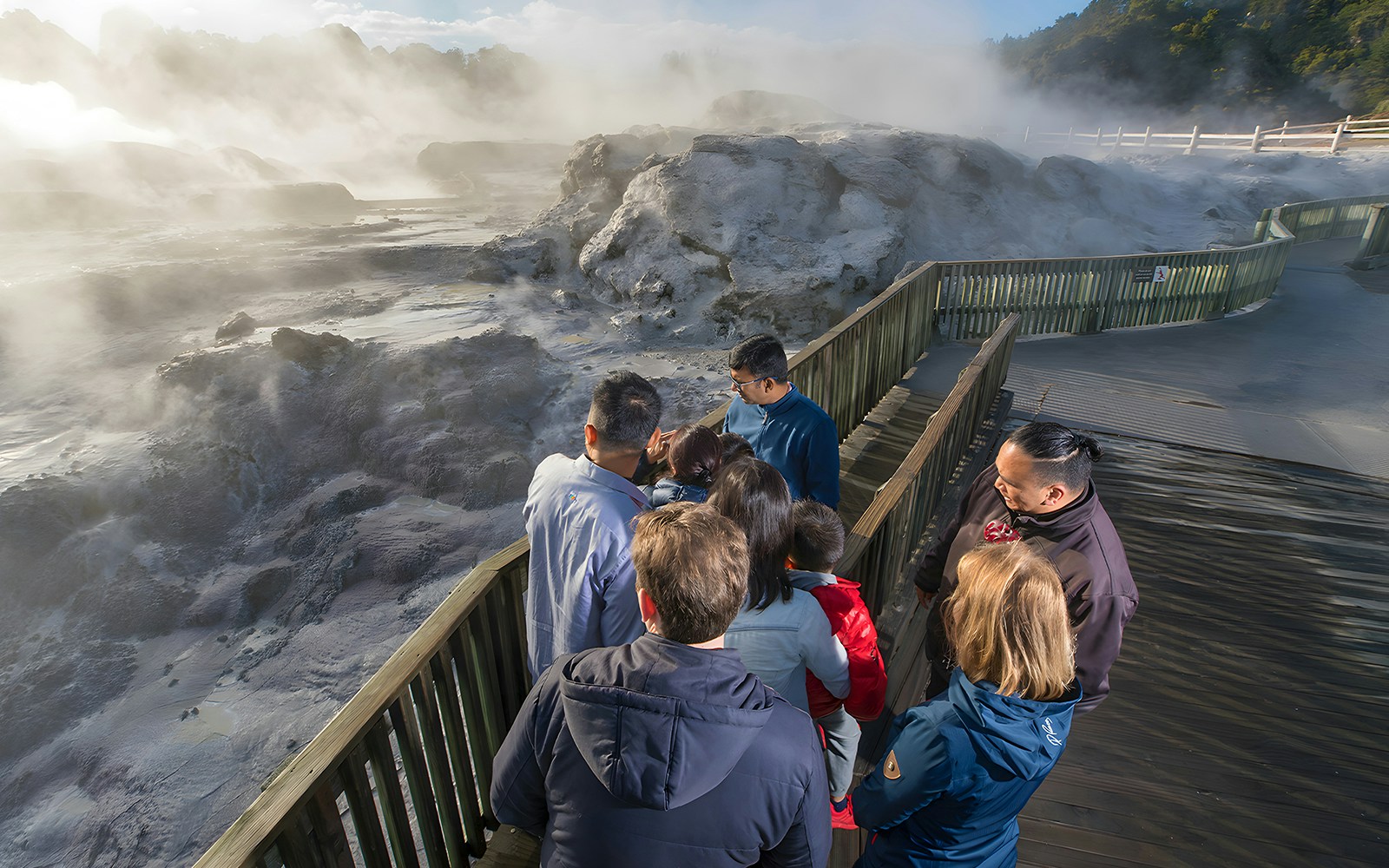 Visitors exploring Te Puia Geothermal Valley