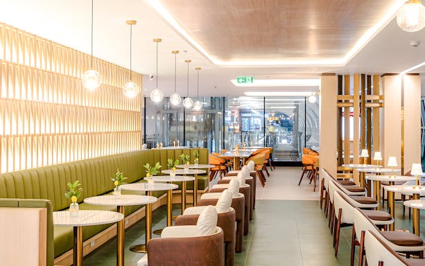 Coral Cosmo Lounge seating area in Concourse C, Bangkok airport, Thailand.