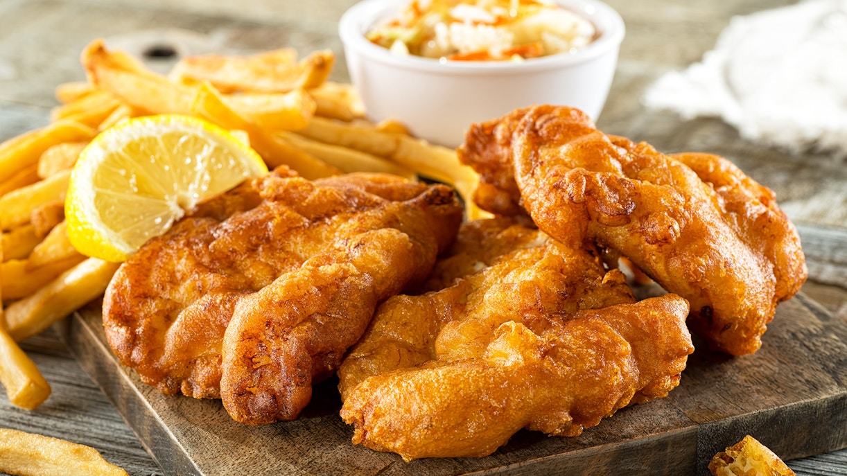 Fish and chips with lemon wedge served Nausicaá Aquarium
