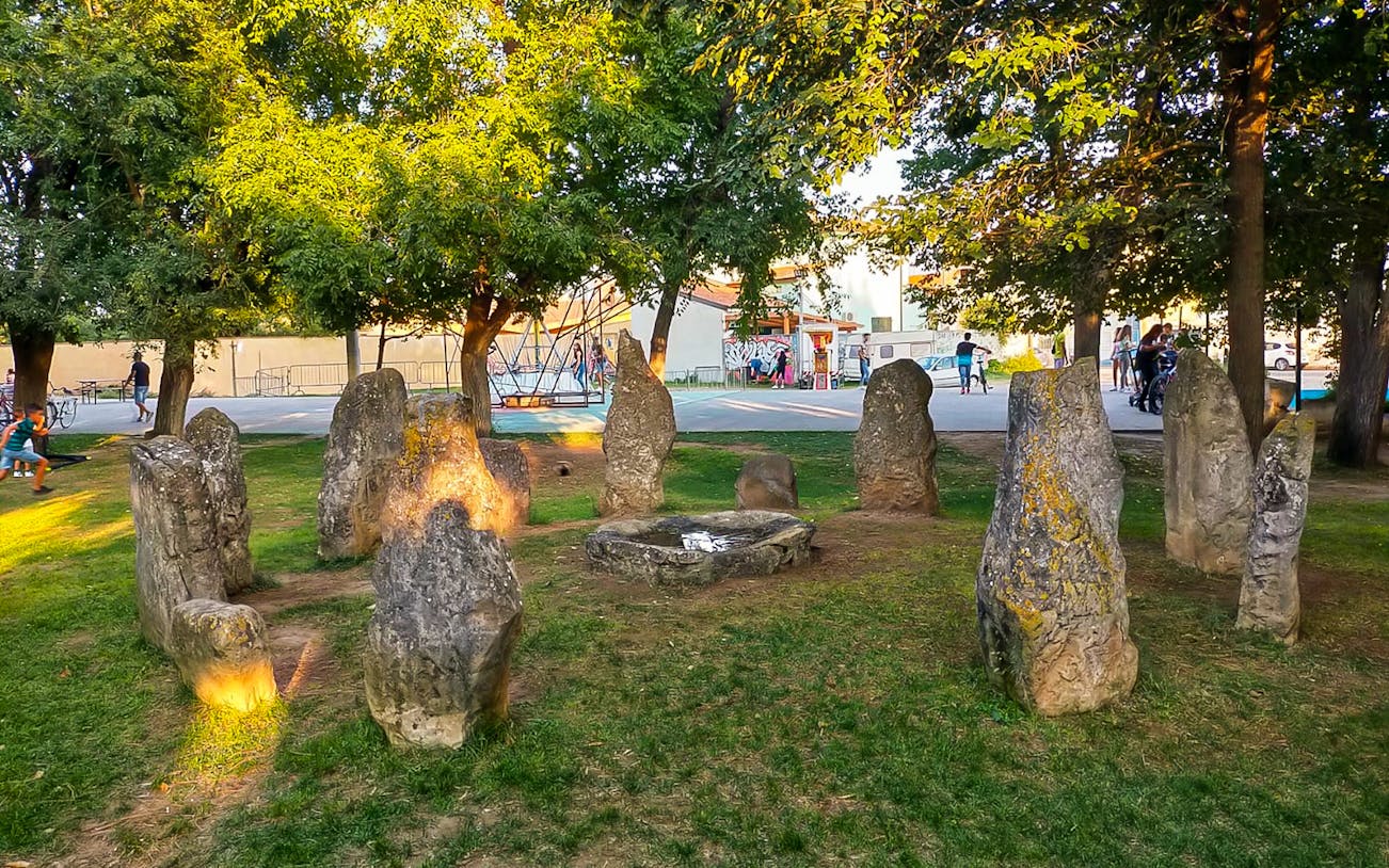 Stone circle in a park during a guided tour of San Sperate City from Cagliari.