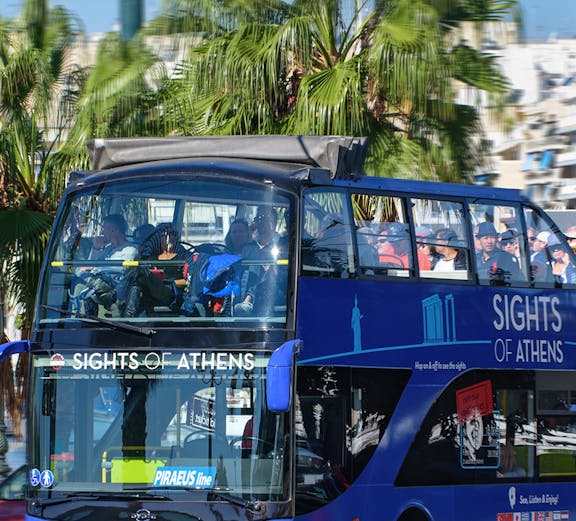 Open-top tour bus in Athens offering hop-on hop-off sightseeing.