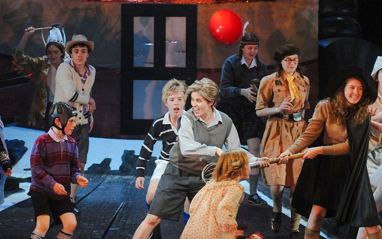 Theatrical performance of Hansel and Gretel in Sydney with actors in costume.