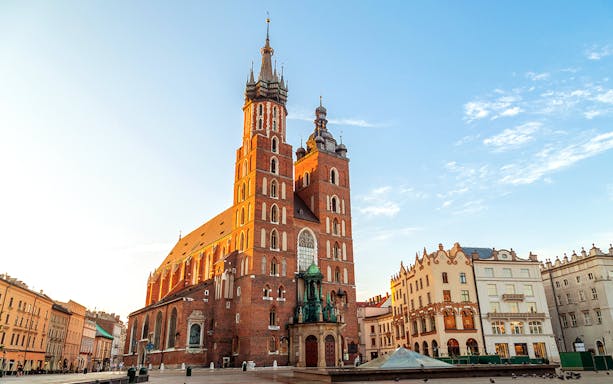 St. Mary’s Basilica in Krakow's Old Town during sunset.