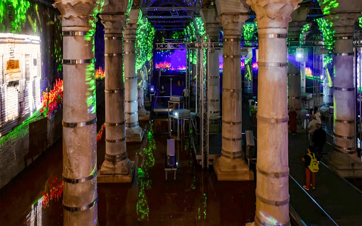 Theodosius Cistern with illuminated columns and informative displays in Istanbul.