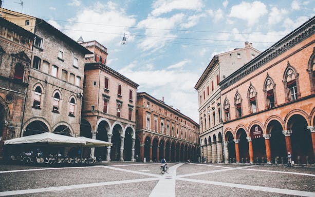 Bologna's historic square with arched porticoes, part of a 3-hour walking tour.