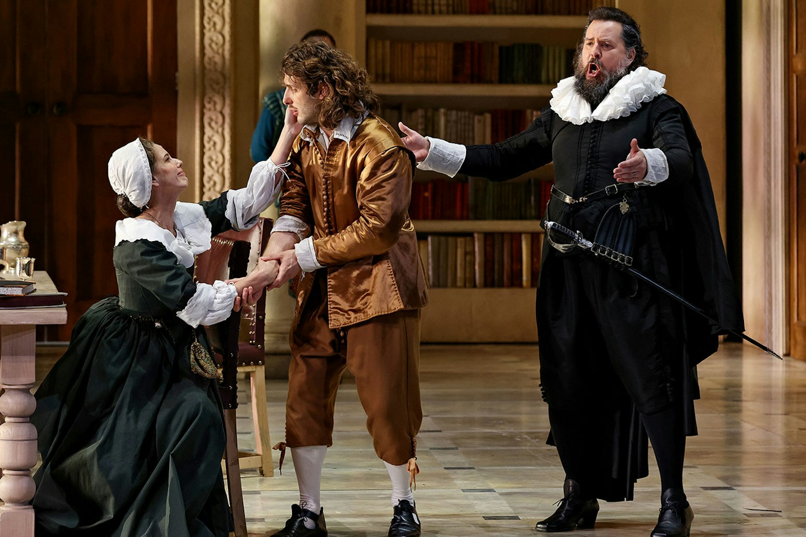 Opera performers in period costumes during a scene from The Marriage of Figaro.