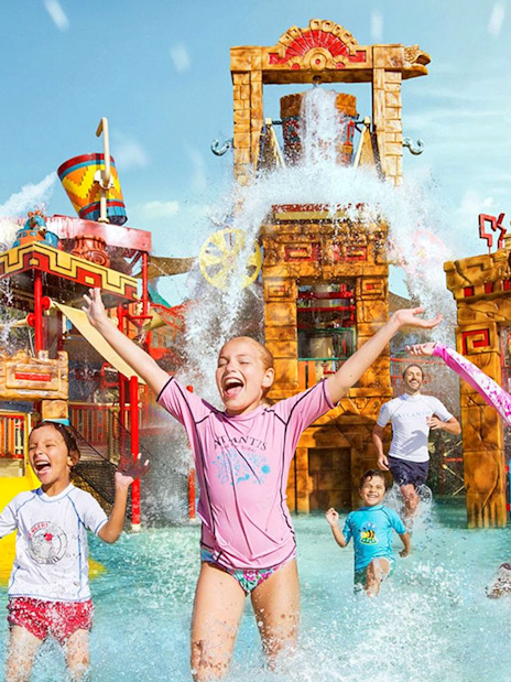 Kids enjoying Splashers ride at Atlantis, The Palm, Dubai waterpark.