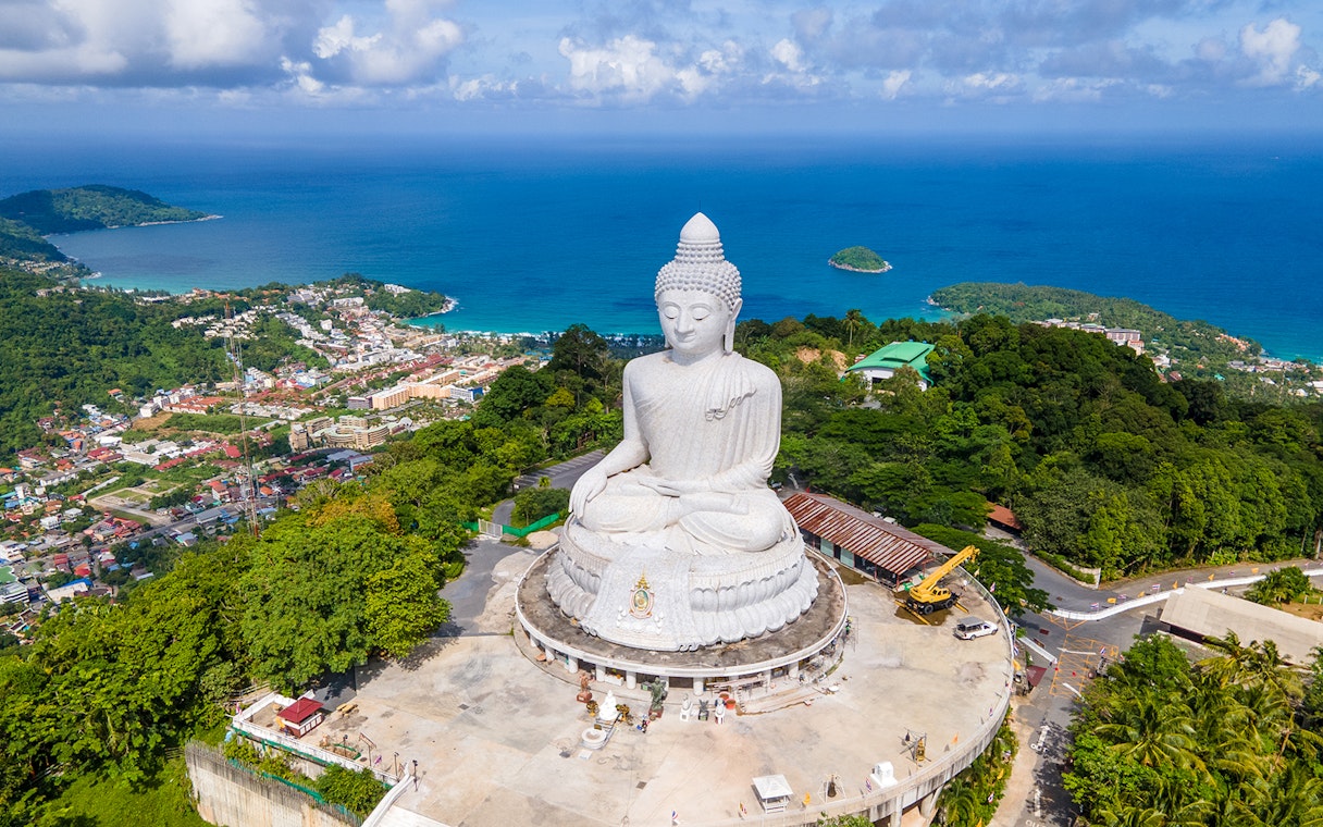 Big Buddha statue overlooking Phuket town and coastline, Thailand.