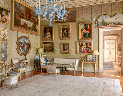 Liria Palace room with historical photos and paintings in Madrid, Spain.