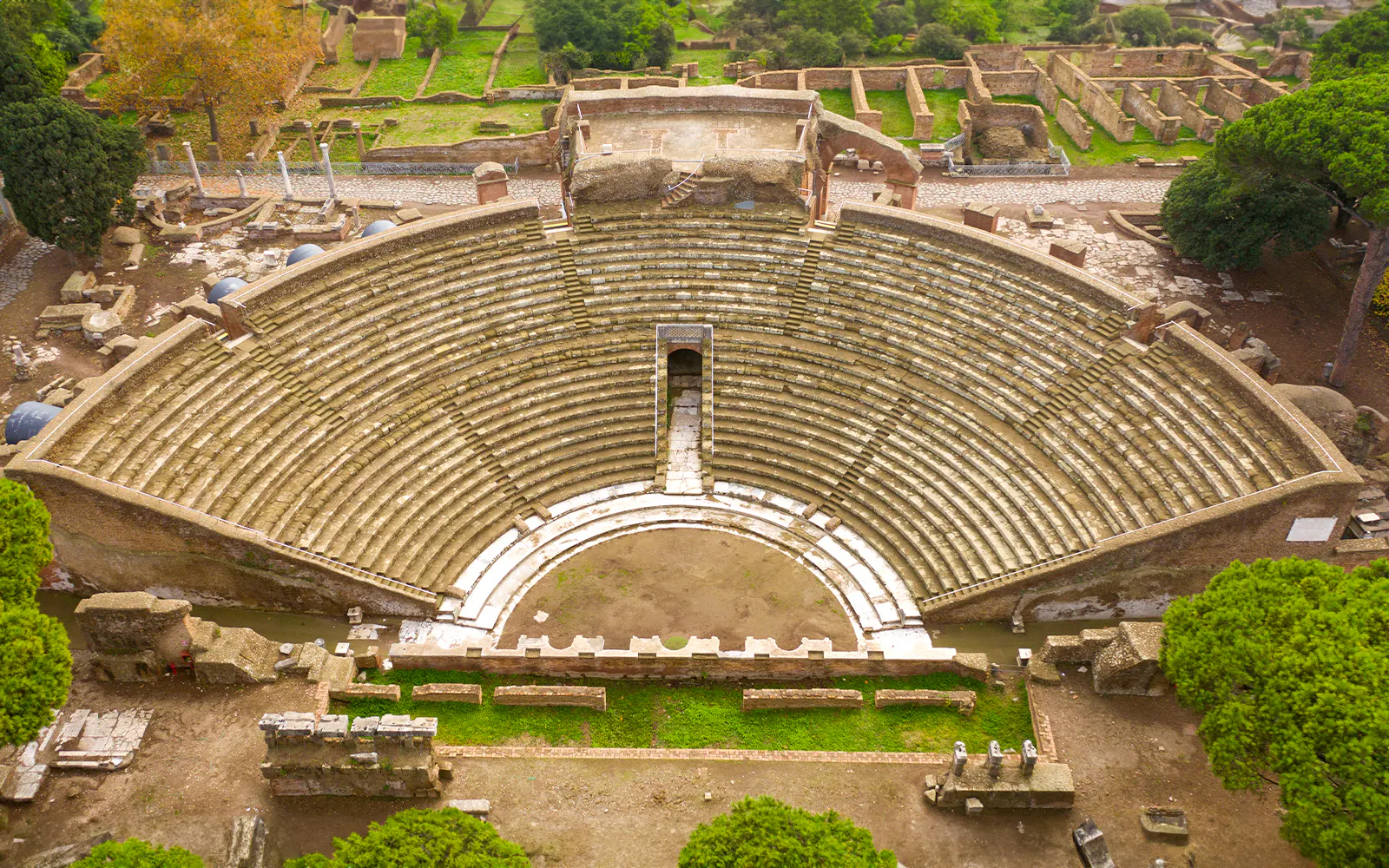 Ancient Roman amphitheater in Ostia Antica, Italy, viewed from above.
