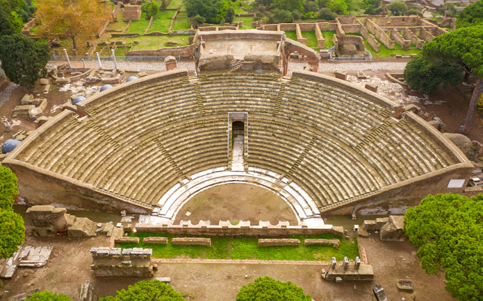 Ancient Roman amphitheater in Ostia Antica, Italy, viewed from above.