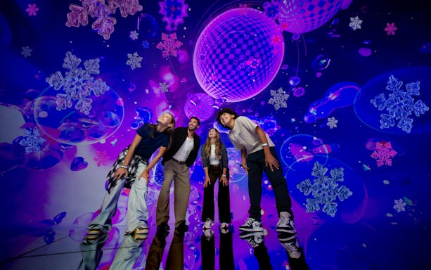 Visitors enjoying immersive digital art at House of Hype.