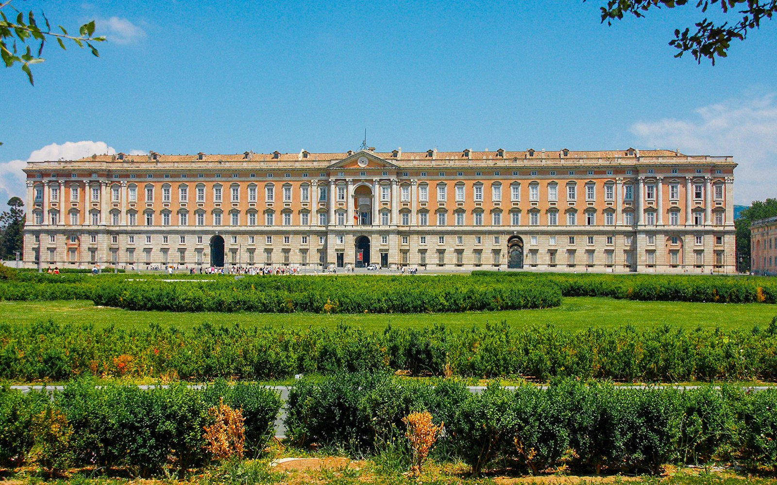 Royal Palace of Caserta facade with gardens, Italy.