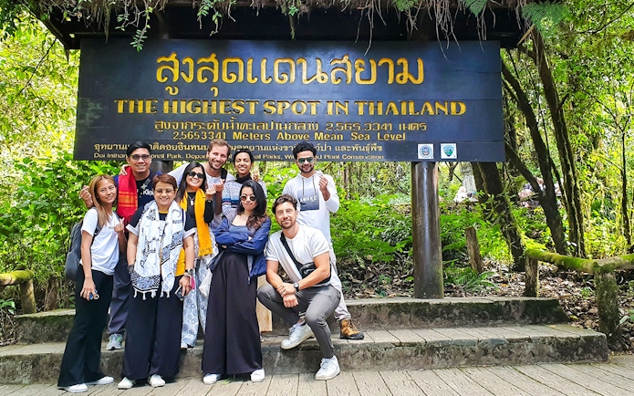 Tourists gather at "The Highest Spot in Thailand" sign, Doi Inthanon National Park.