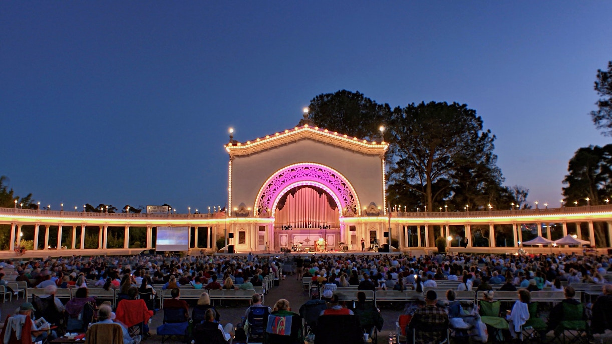 Night concert at Spreckels Organ Pavilion, Balboa Park, San Diego, with audience seated.