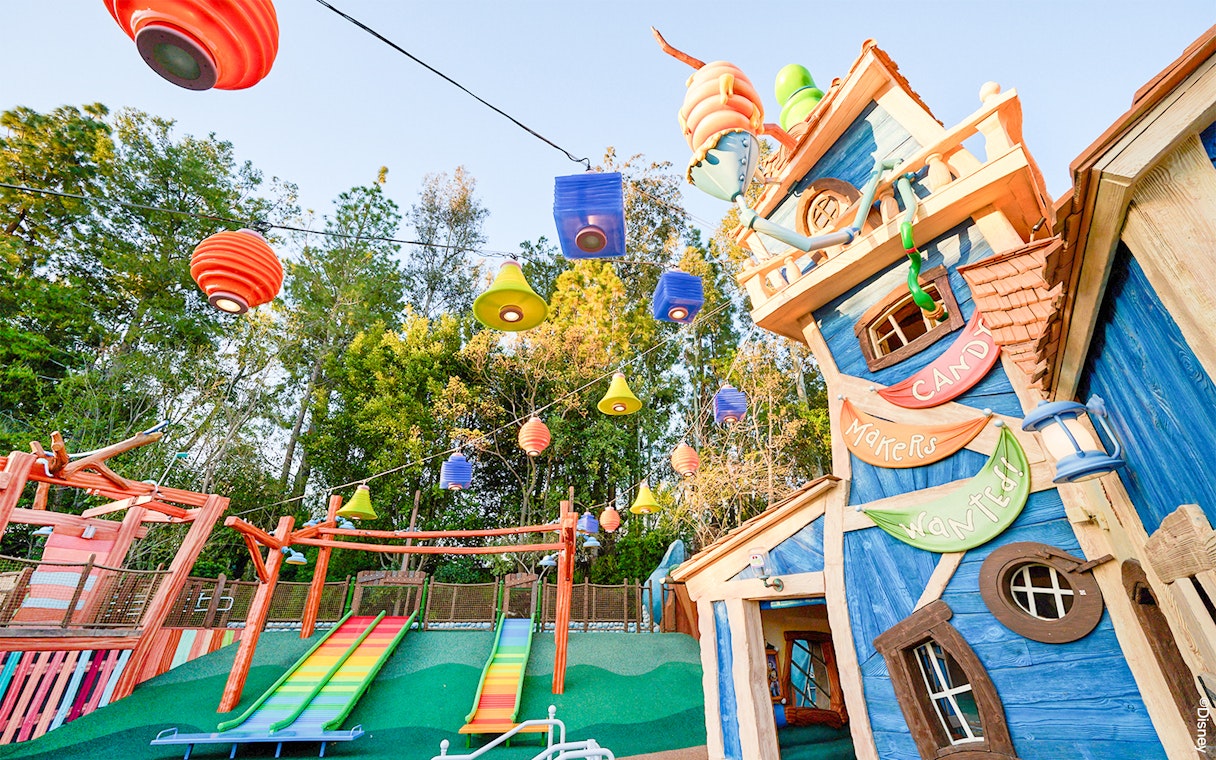 Colorful slides and whimsical building in Mickey's Toontown at Disneyland Park, California.