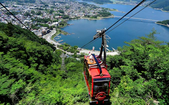 Kawaguchiko Ropeway overlooking Lake Kawaguchi and town, Japan.