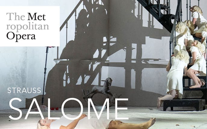 Salome opera scene at the Metropolitan Opera with performers on a staircase.