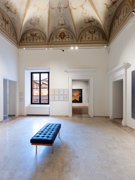 Palazzo delle Papesse exhibition room with modern art paintings on walls.