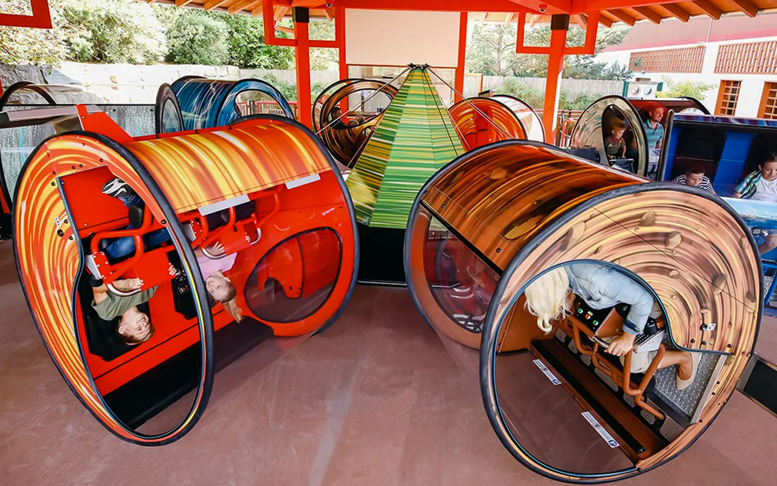 Guests enjoying spinning rides at LEGOLAND Deutschland.