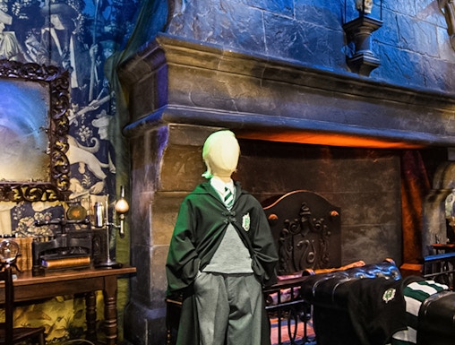 Draco Malfoy costume in Slytherin common room on Harry Potter London tour.