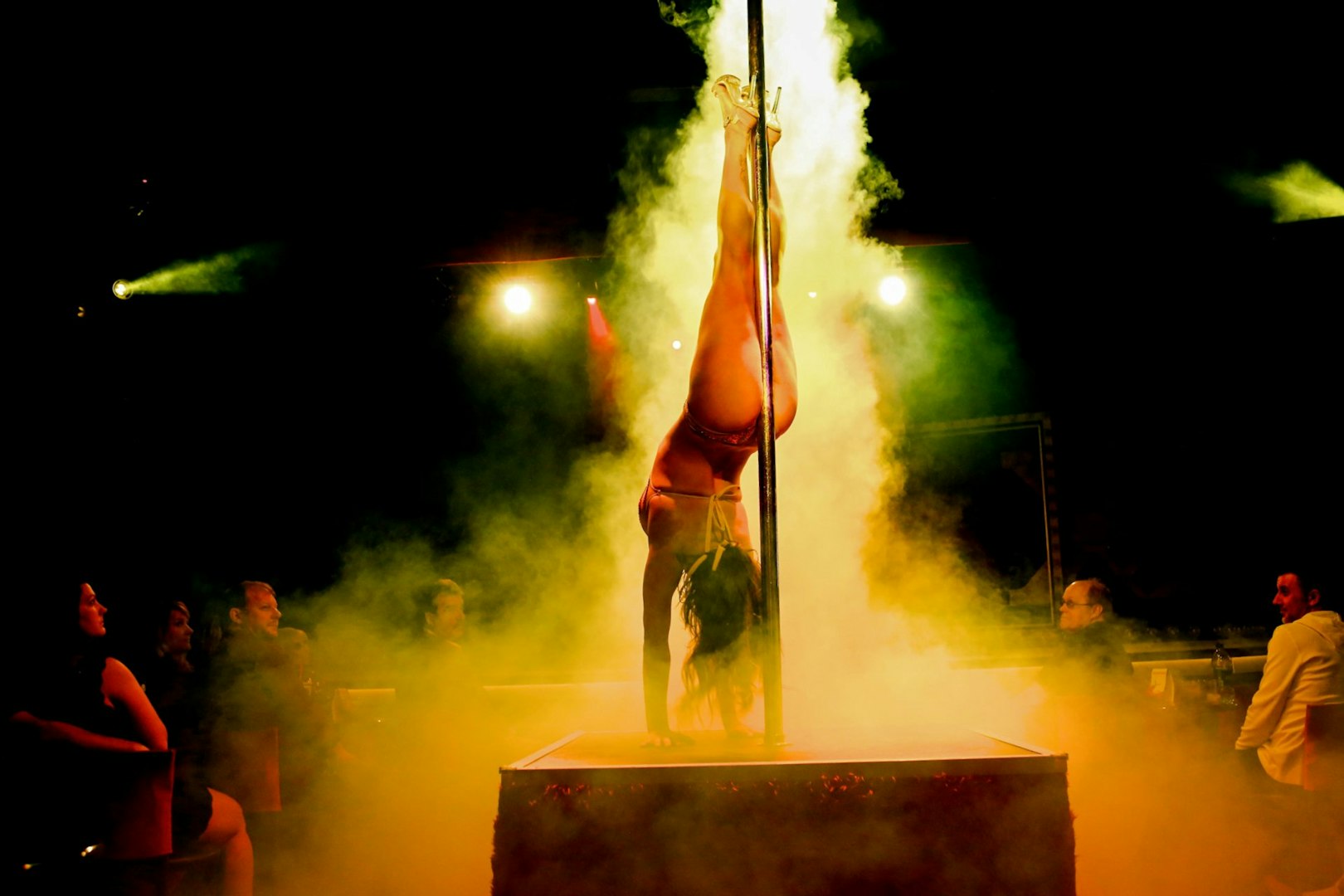 Performer on stage during X Burlesque - Kick'n Topless Revue, Vegas.